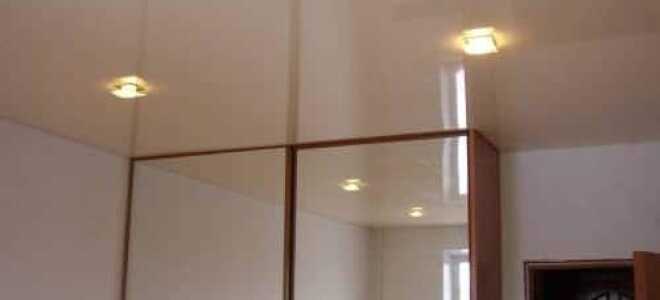 Шкаф до потолка: варианты соединения с натяжным потолком